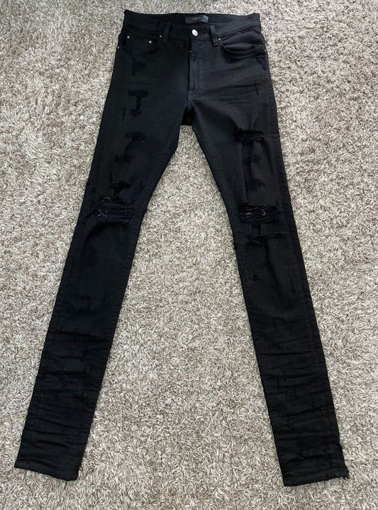 Amiri shot and destroyed jeans - - DMC