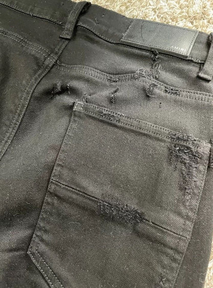 Amiri shot and destroyed jeans - - DMC