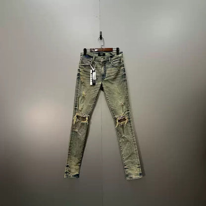 AMIRI Blue Wash Damaged Pants