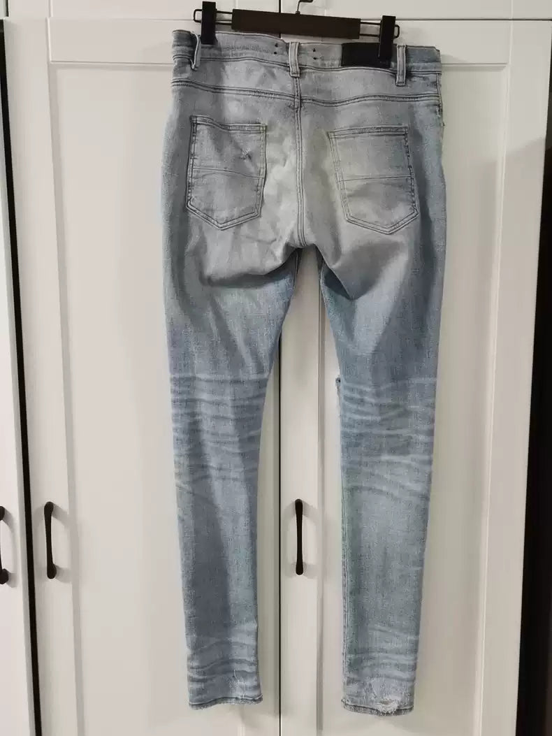 Amiri ripped jeans