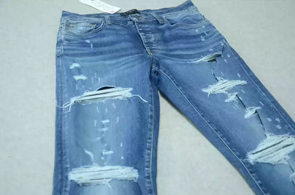 Amiri Blue washed cat paw big damage jeans