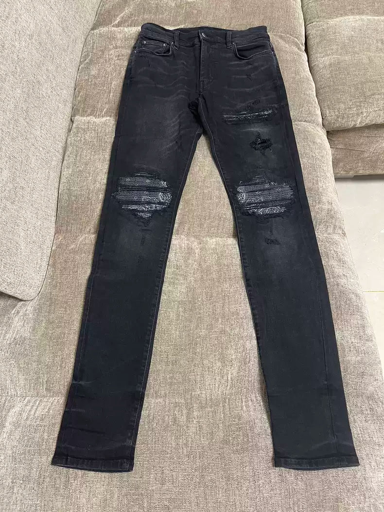 Amiri patchwork damages jeans