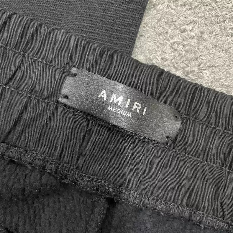 AMIRI black zipper ripped sweatpants