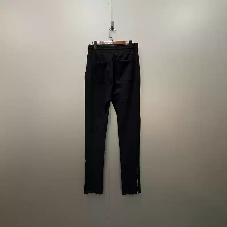 AMIRI black zipper ripped sweatpants