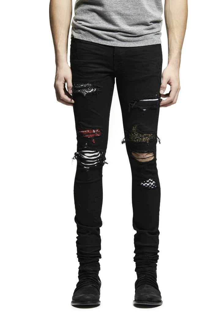 Amiri checkerboard cashew flower splatter art patch black jeans