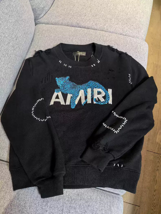 Amiri Blue Panther Logo embroidered extensively, with broken stitching on round neck hoodie