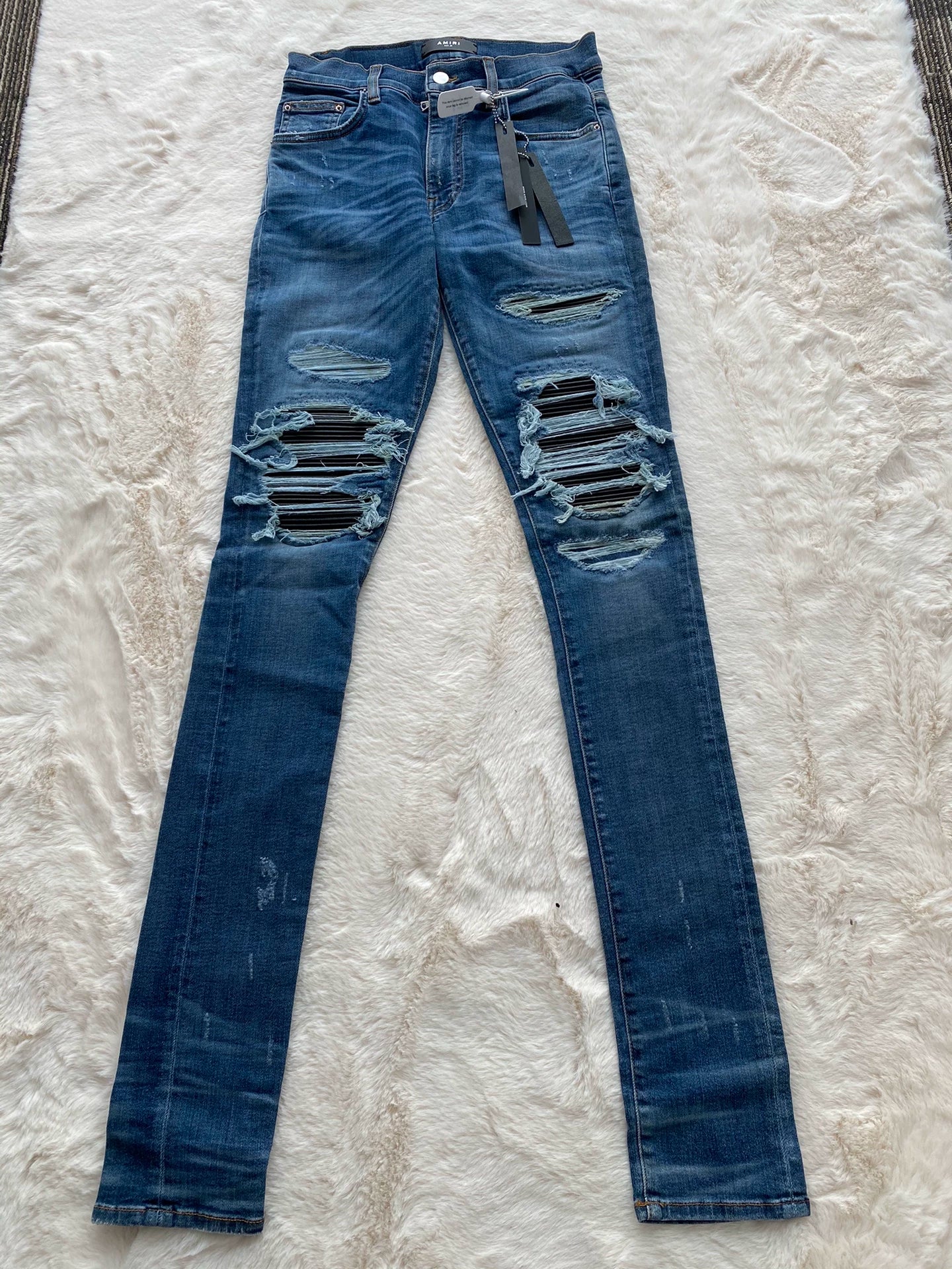 Amiri washed blue and blue patchwork 16AW MX1 jeans