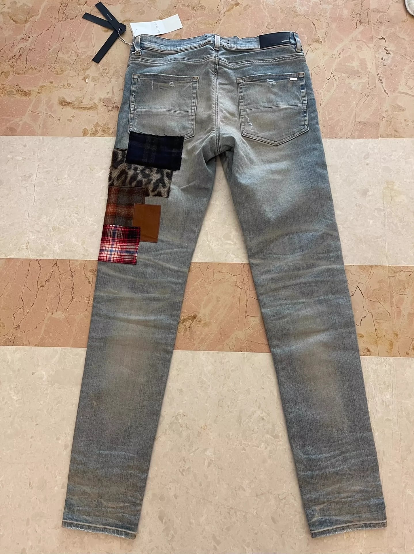 Amiri 21Fw Distressed Patchwork Jeans