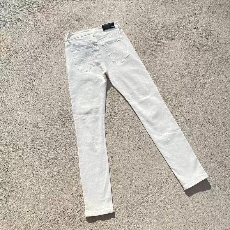 AMIRI white rhinestone ripped jeans pants