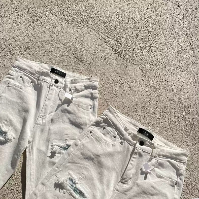 AMIRI white rhinestone ripped jeans pants