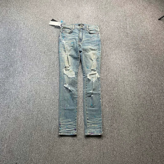 AMIRI ink splatter damages jeans