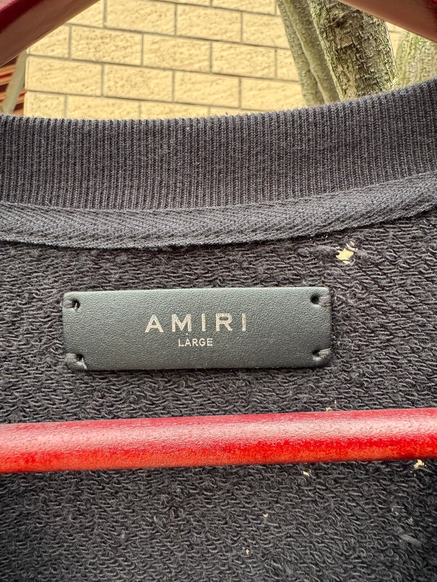 Amiri shotgun bullet hole damages hoodie