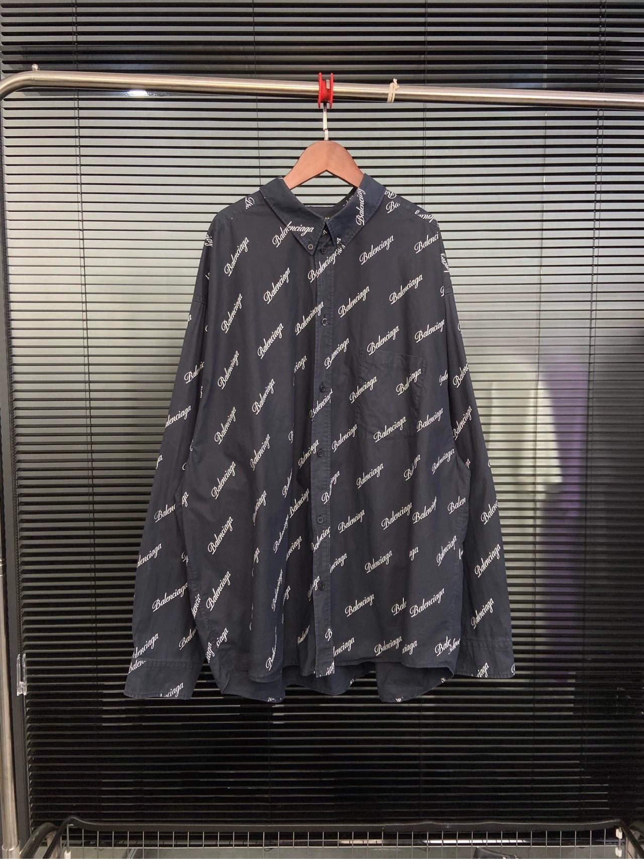 Balenciaga with full print of bullet screen cursive letter logo, dark blue shirt