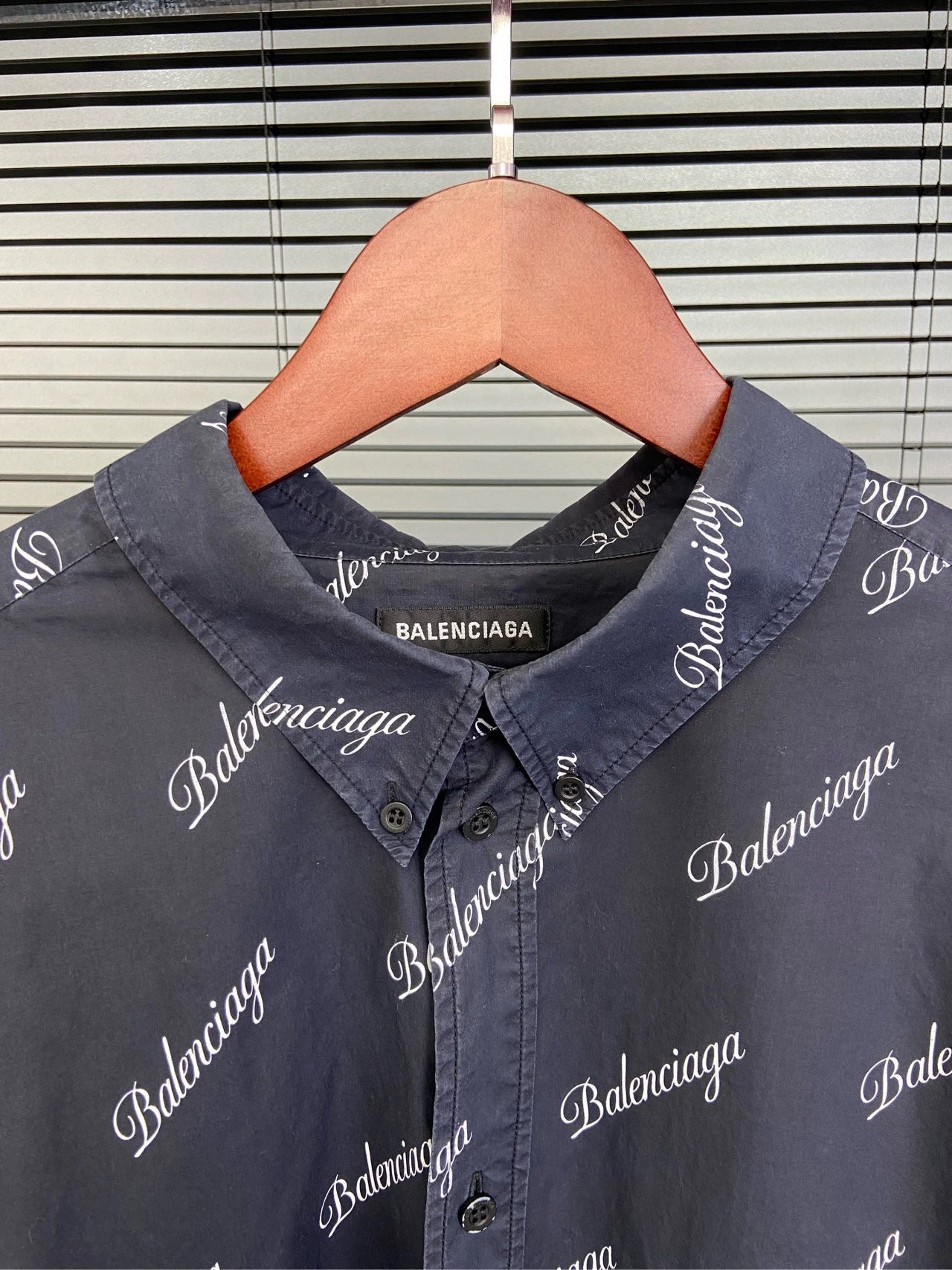 Balenciaga with full print of bullet screen cursive letter logo, dark blue shirt