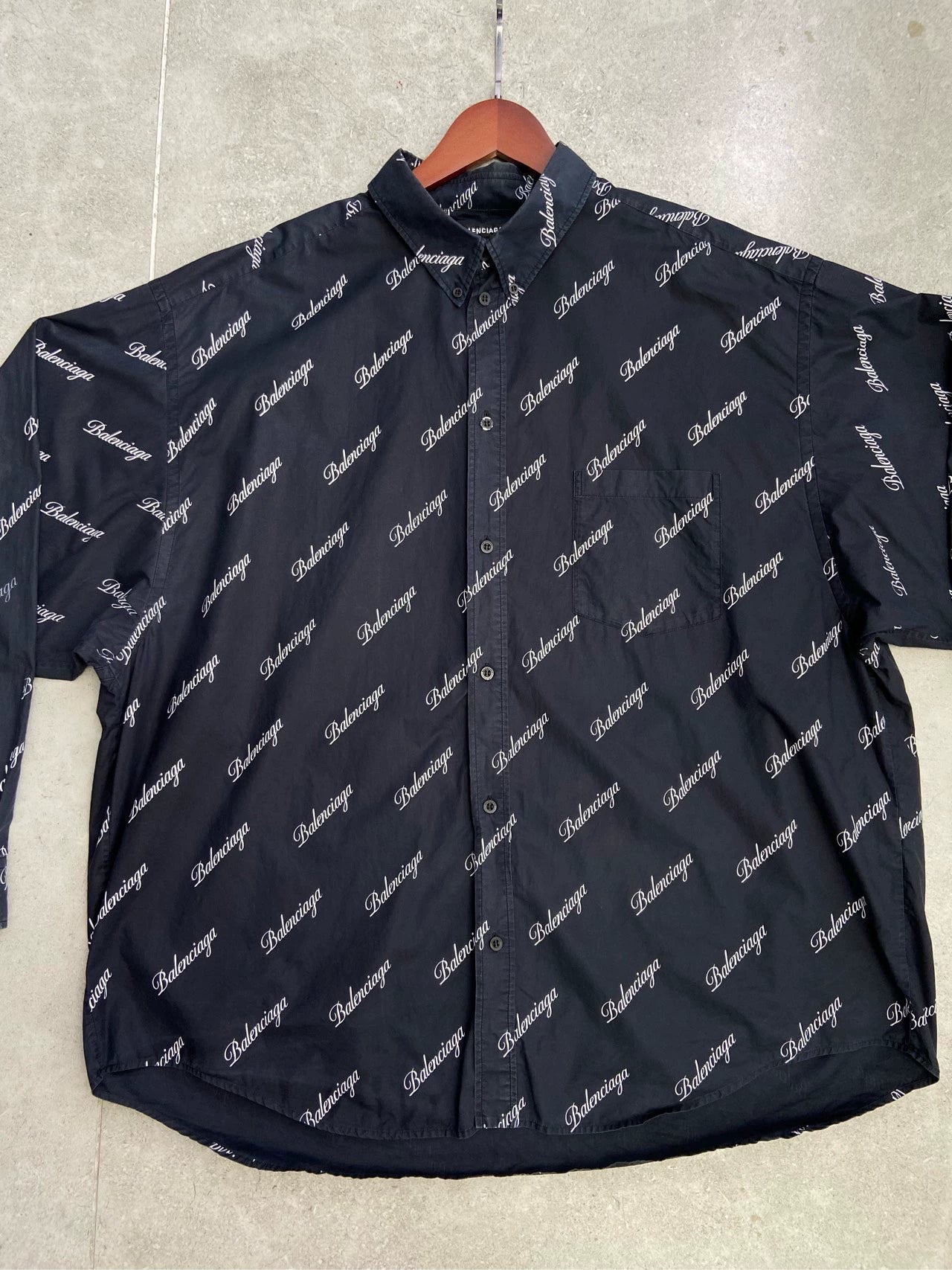 Balenciaga with full print of bullet screen cursive letter logo, dark blue shirt