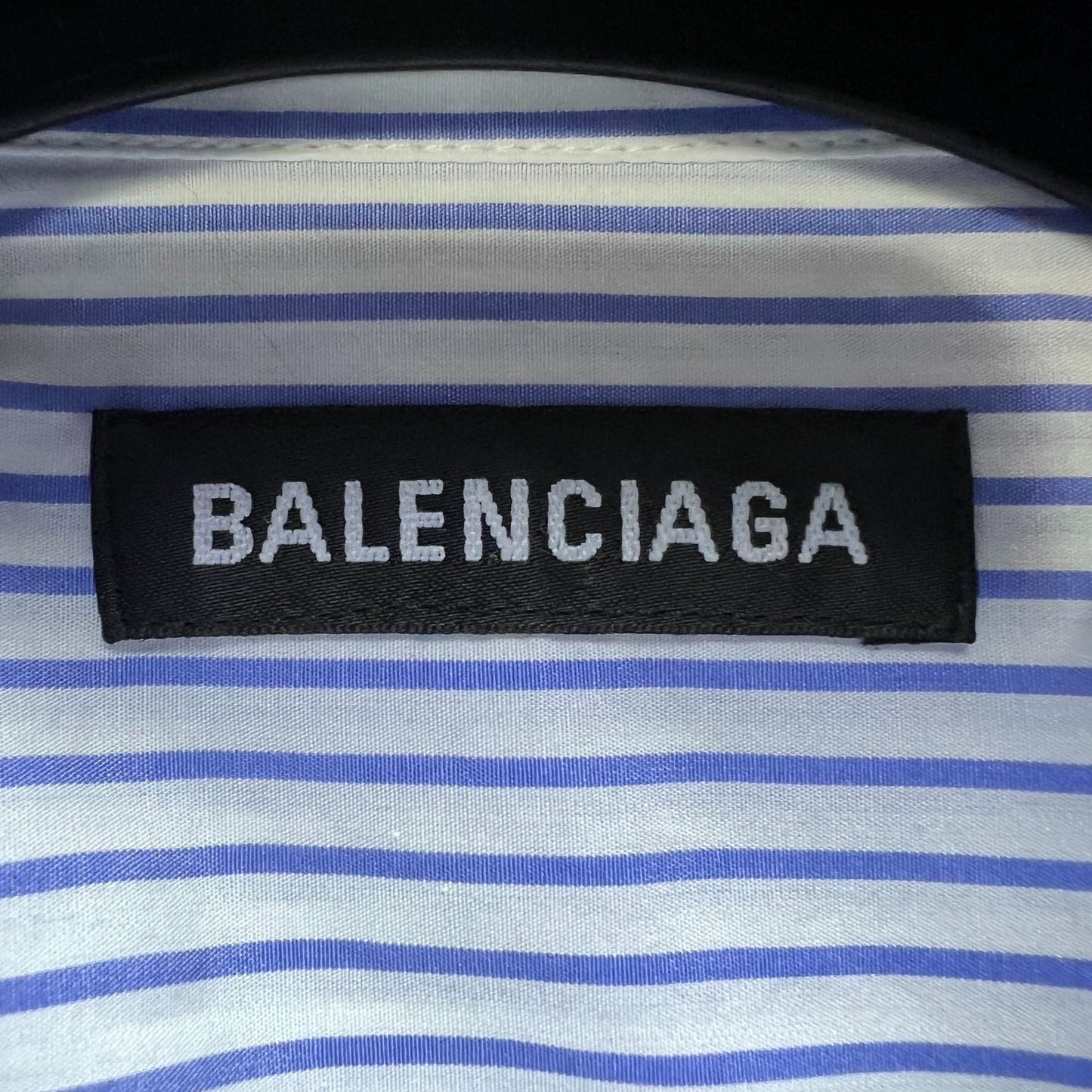 Balenciaga small logo on the chest and email shirt on the back