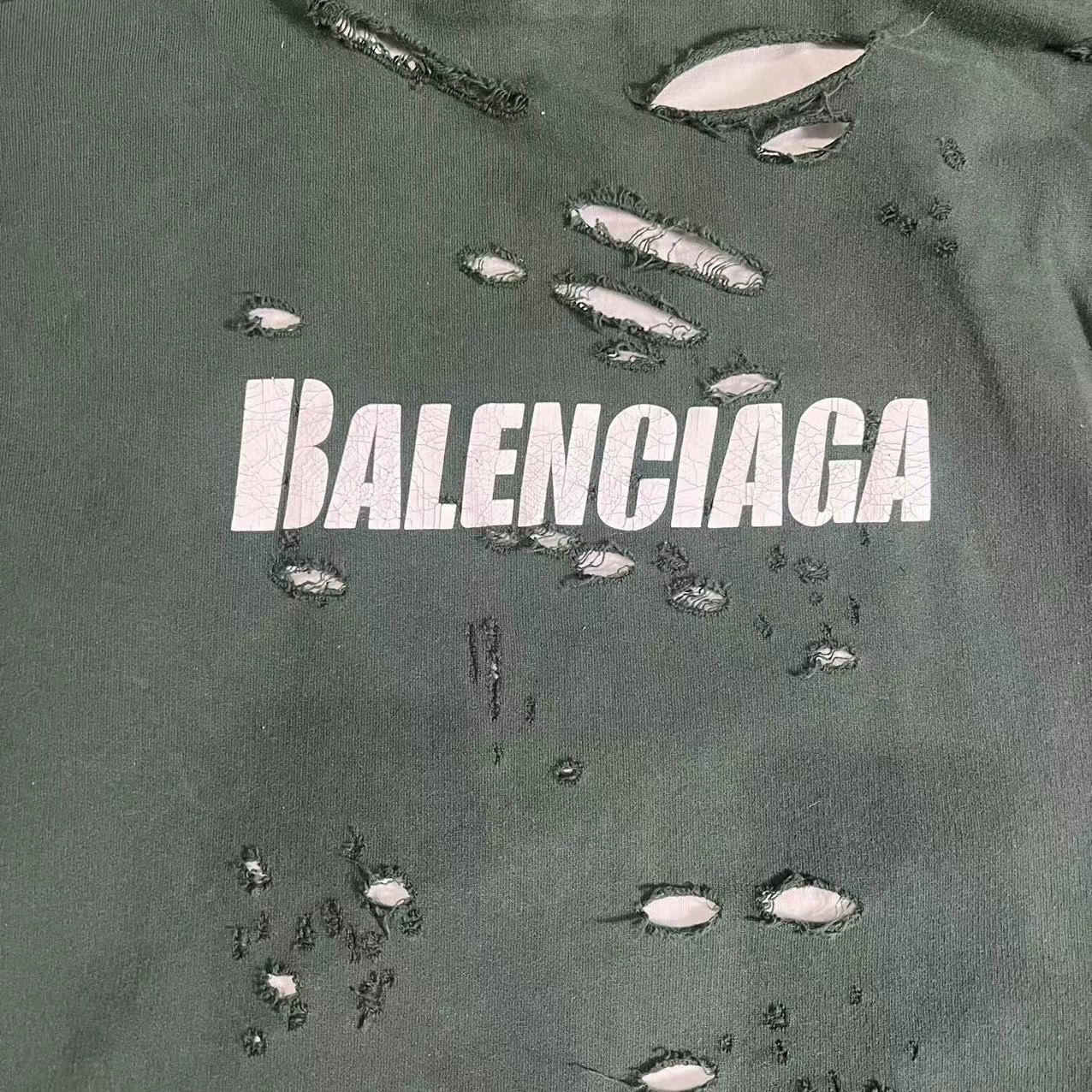 Balenciaga destroys hoodies