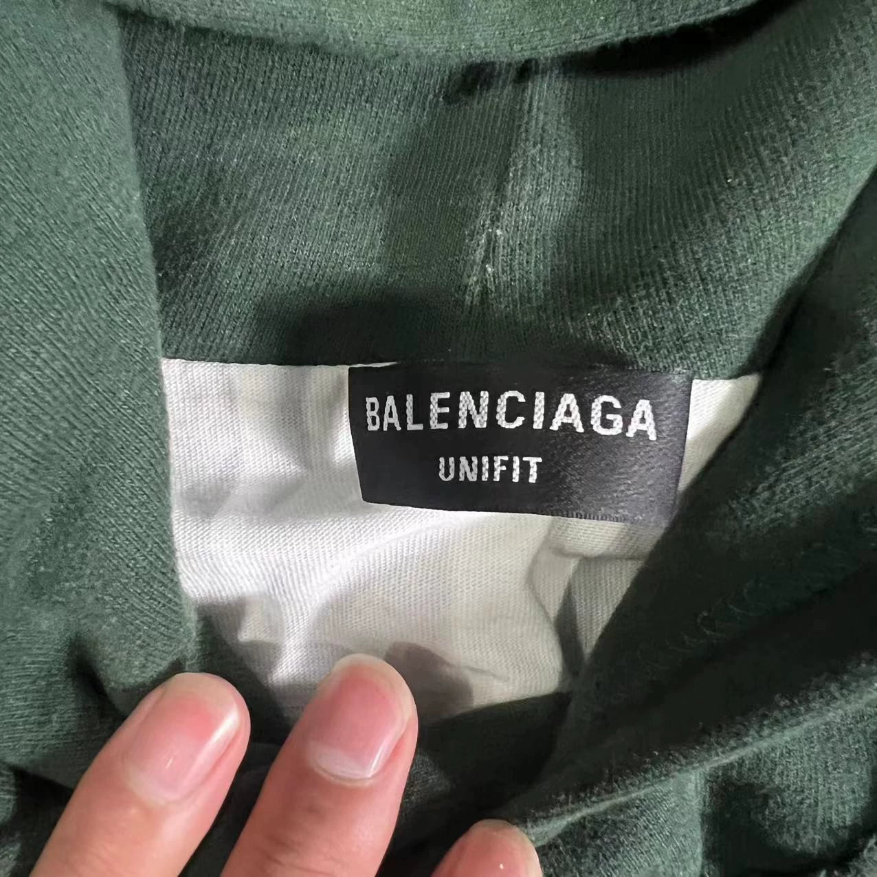 Balenciaga destroys hoodies