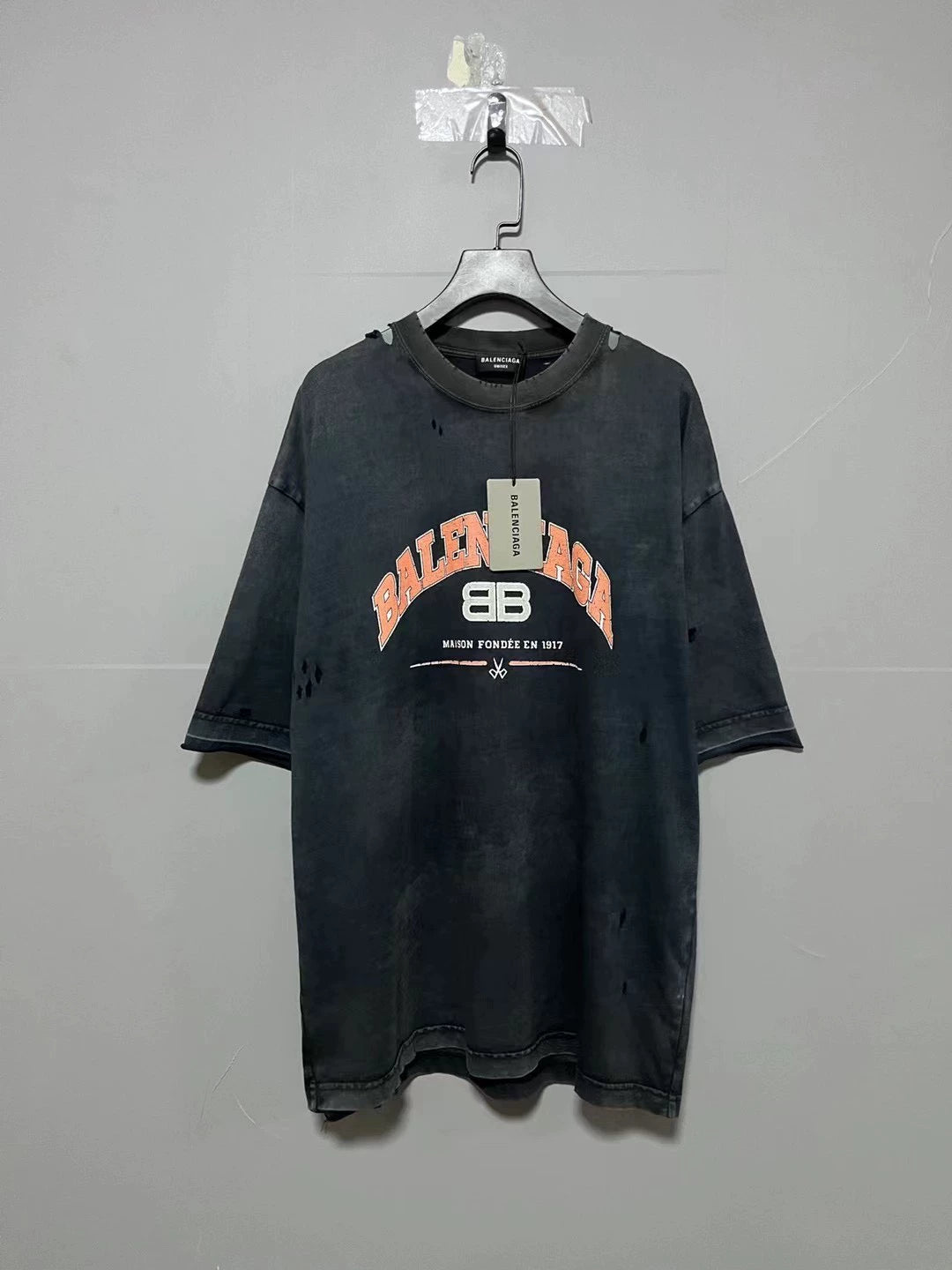 Balenciaga doing old damage with double B scissors logo and short sleeves