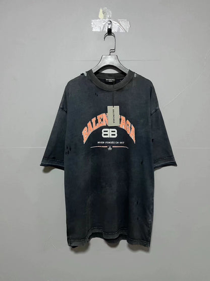 Balenciaga doing old damage with double B scissors logo and short sleeves