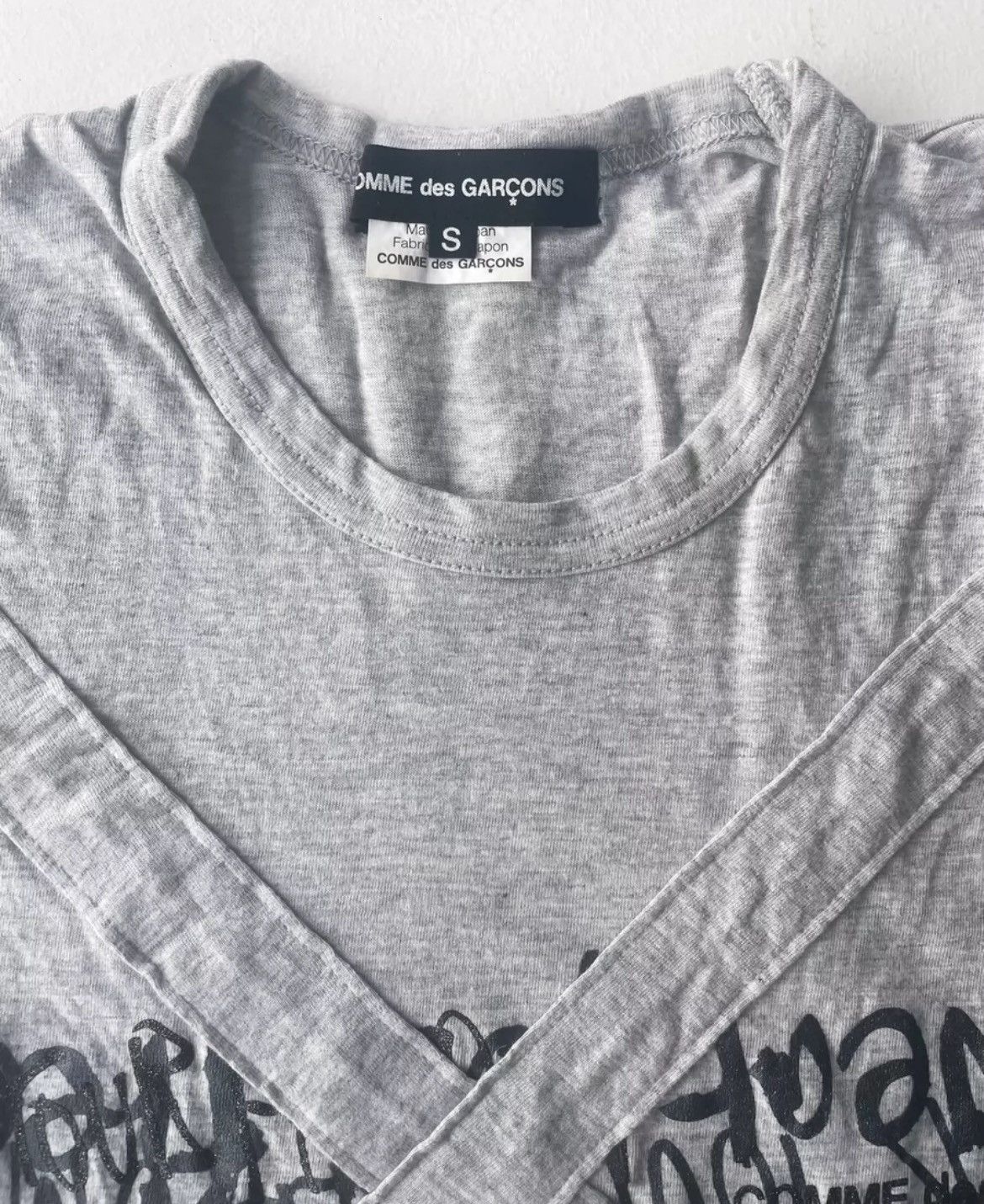 Comme Des Garcons fork slogan free tshirt - DMC