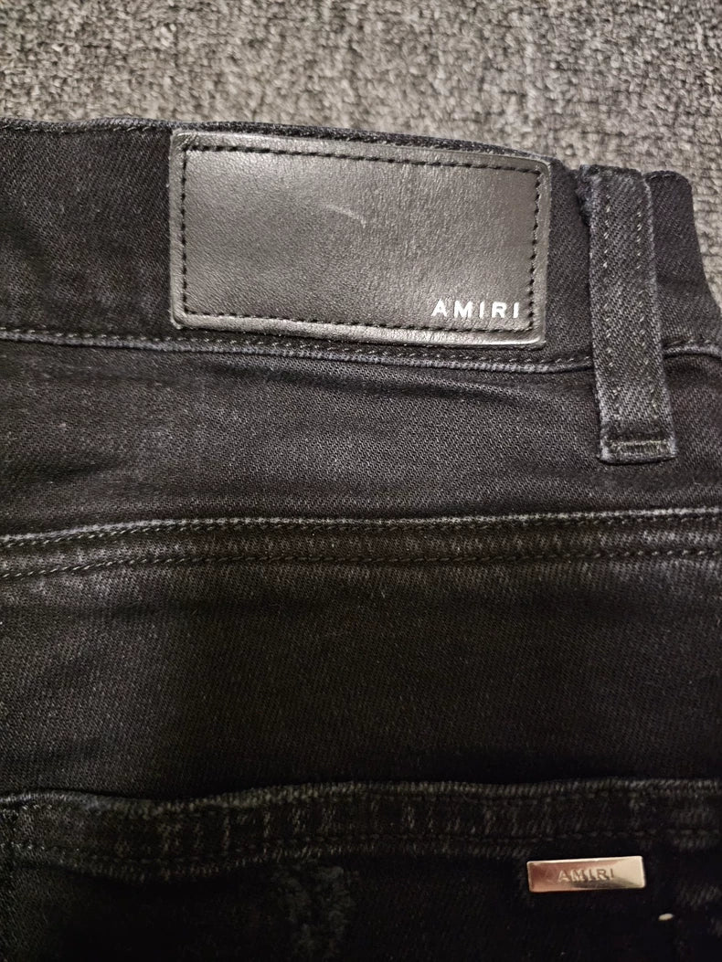 Amiri Distressed Patchwork Denim Jeans-yf