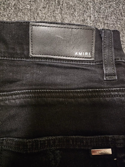 Amiri Distressed Patchwork Denim Jeans-yf