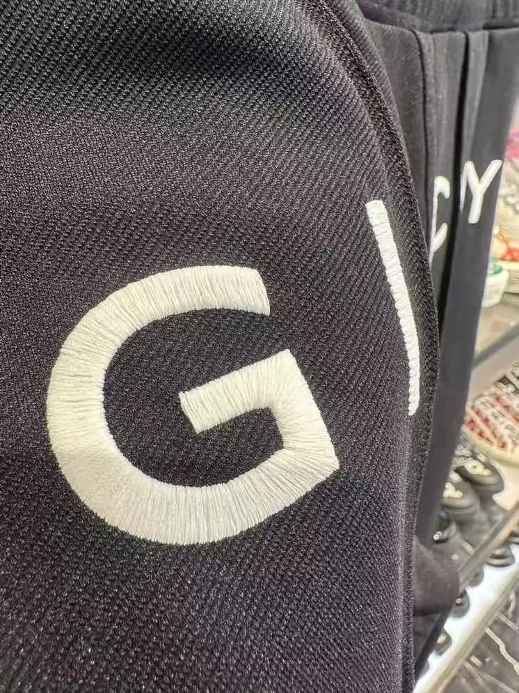 GIVENCHY solid color belted sweatpants-zp