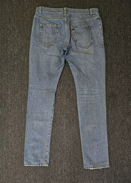 Saint Laurent Distressed Knee Denim Jeans-yf