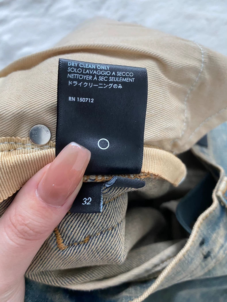 Amiri Distressed Denim Pants in Mud Color