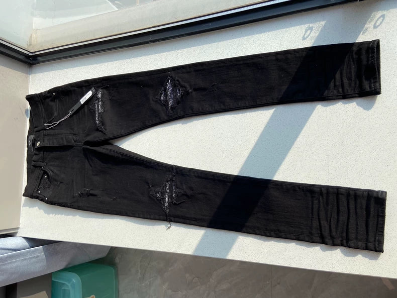 Amiri MX1 Bandana Jeans with Ripped Design
