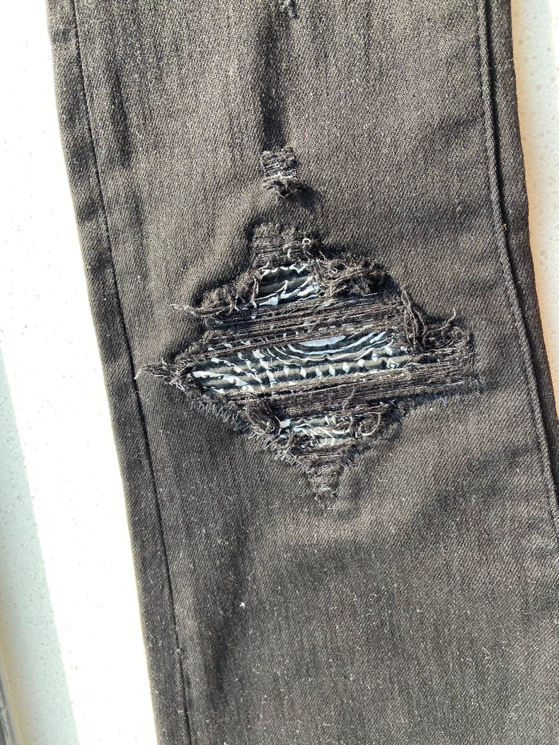 Amiri MX1 Bandana Jeans with Ripped Design