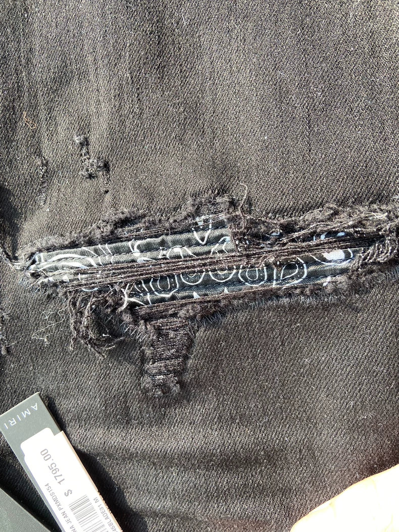 Amiri MX1 Bandana Jeans with Ripped Design
