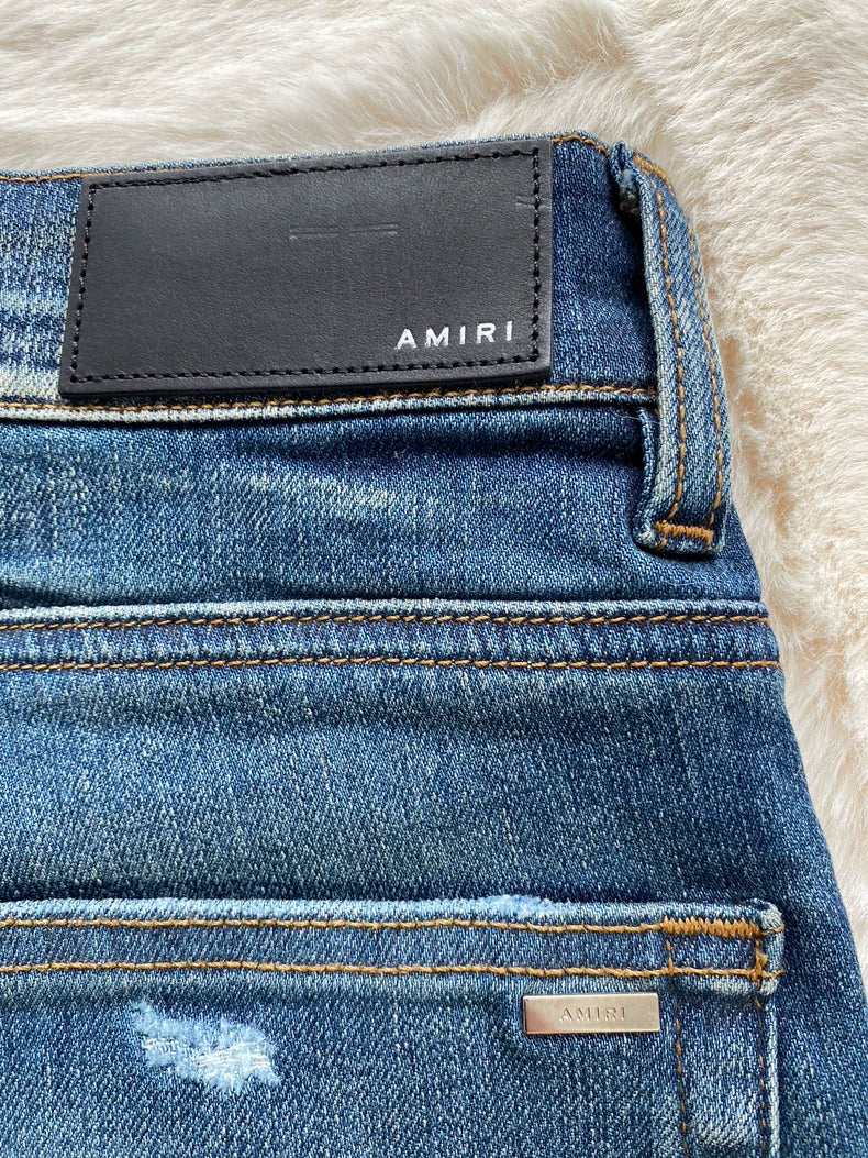 Amiri MX1 Ripped Denim Jeans