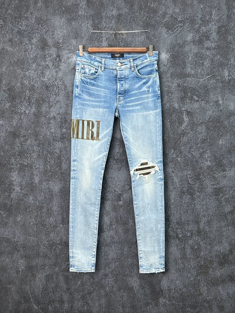 AMIRI Distressed Logo Embroidered Jeans