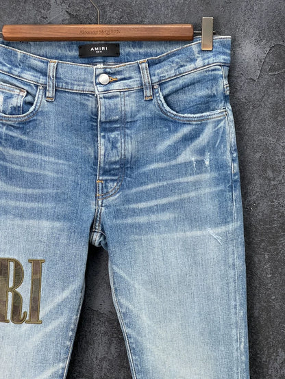 AMIRI Distressed Logo Embroidered Jeans