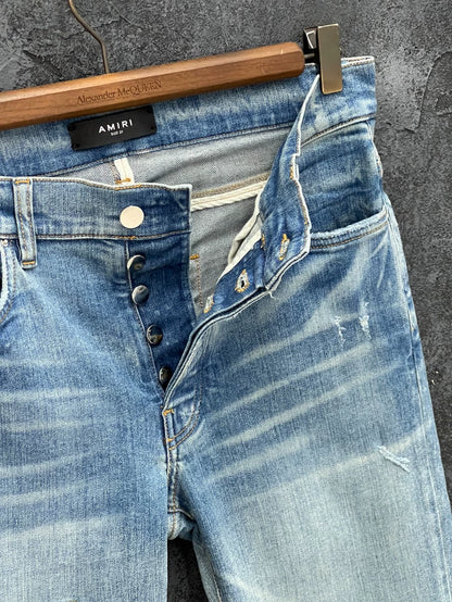 AMIRI Distressed Logo Embroidered Jeans
