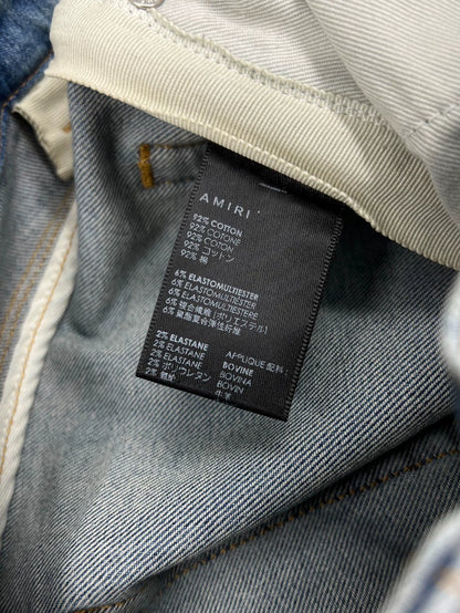 AMIRI Distressed Logo Embroidered Jeans