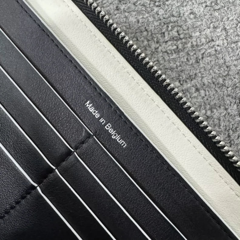 Delvaux Black Leather Wallet with Hat Design