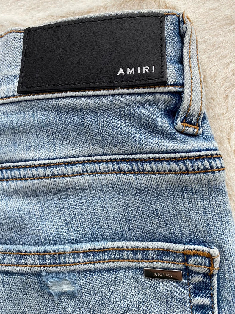 Amiri Playboy Collaboration Distressed Denim Pants