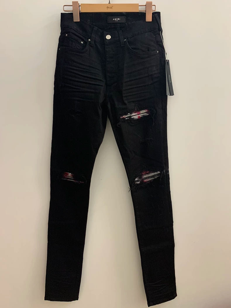 Amiri Black Denim Pants with Artistic Patchwork