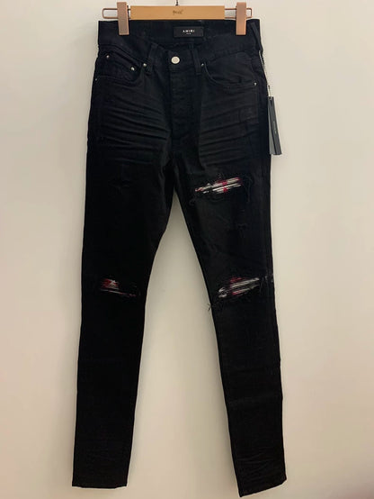 Amiri Black Denim Pants with Artistic Patchwork