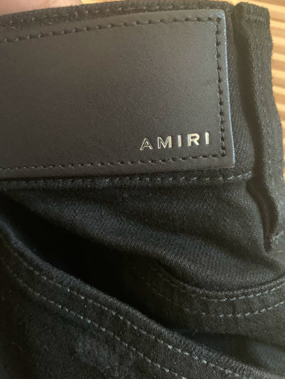 Amiri Black Denim Pants with Artistic Patchwork