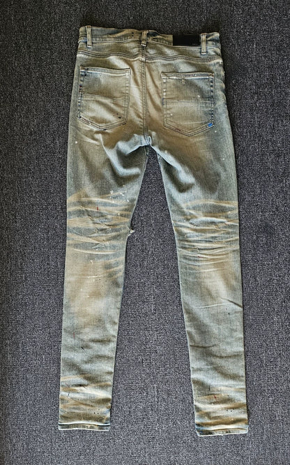 Amiri Yellow Clay Washed Paint Splatter Jeans-yf