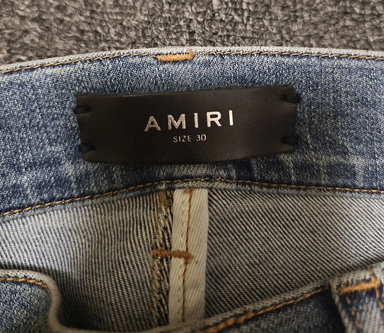 Amiri Distressed Denim Jeans With Paint Splatter-yf