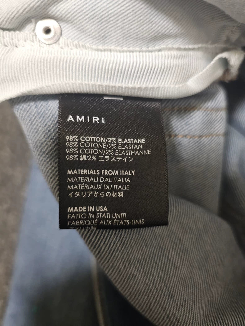 Amiri Distressed Denim Jeans With Paint Splatter-yf