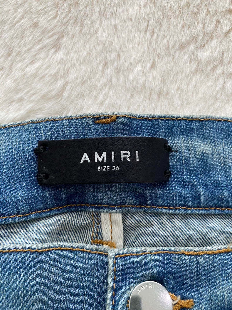 Amiri Distressed Denim MX1 Jeans in Blue
