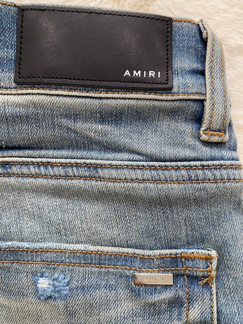 Amiri Distressed Denim MX1 Jeans in Blue