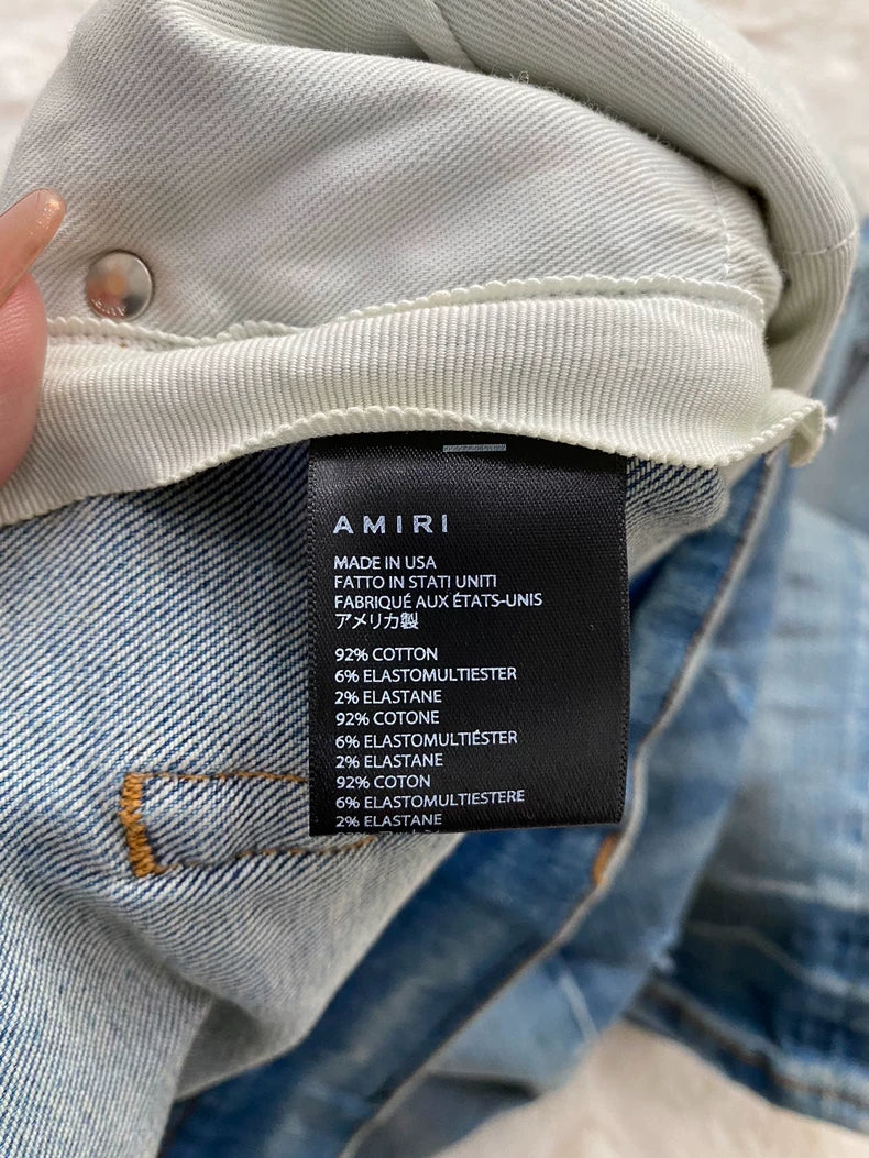 Amiri Distressed Denim MX1 Jeans in Blue