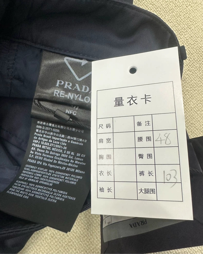 Prada Metal Triangle Pocket Casual Pants